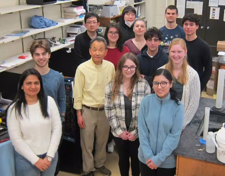 The Cho group photographed together in the lab